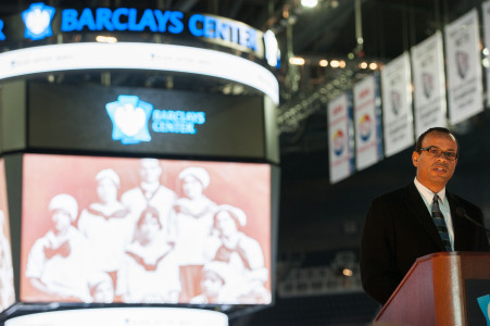 Claude Johnson, Founder of the Black Fives Foundation, tells the story of the Black Fives Era to three generations of Brooklyn’s basketball players during an event at the Barclays Center in Brooklyn: descendants of Brooklyn-connected Black FivesEra teams, Nets player CJ Watson, and students from P.S. 282. (Feb. 4, 2013)
(Photo by Nancy Borowick)